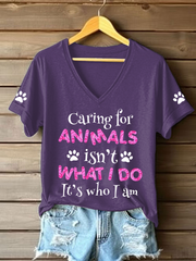 Women's caring for animals isn't what I do it's who I am V-neck T-shirts