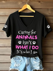 Women's caring for animals isn't what I do it's who I am V-neck T-shirts